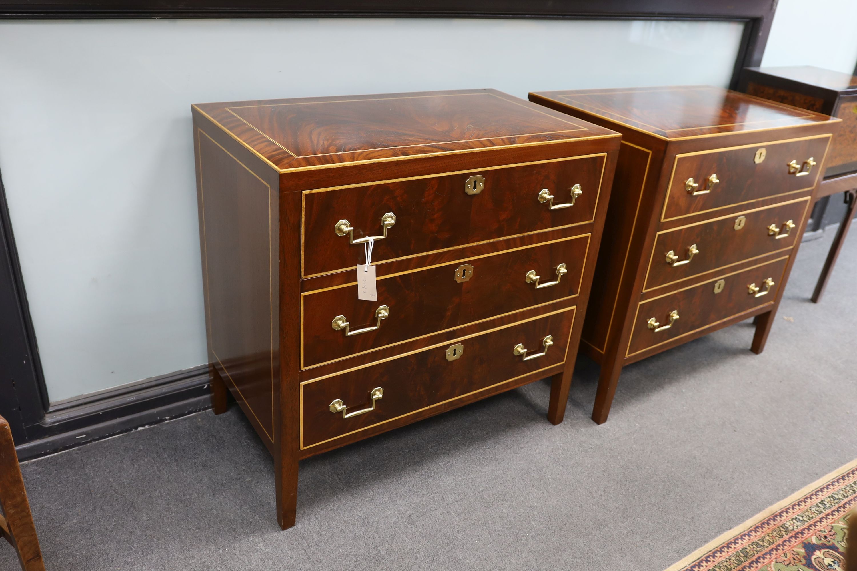 A pair of George IV style inlaid mahogany three drawer chests, width 79cm, depth 46cm, height 78cm